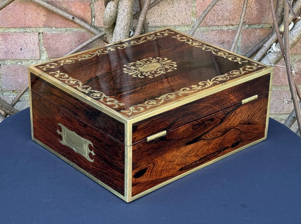 Rear right view of an Antique Jewellery Box in Rosewood with Scrollwork Brass Inlay.