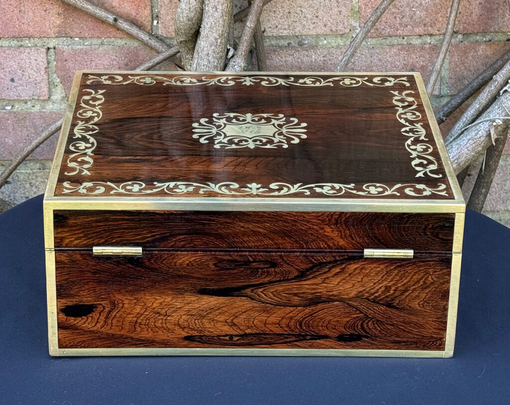 Rear view of an Antique Jewellery Box in Rosewood with Scrollwork Brass Inlay.