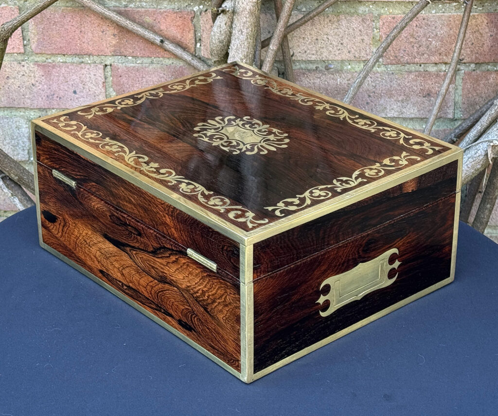 Rear left view of an Antique Jewellery Box in Rosewood with Scrollwork Brass Inlay.