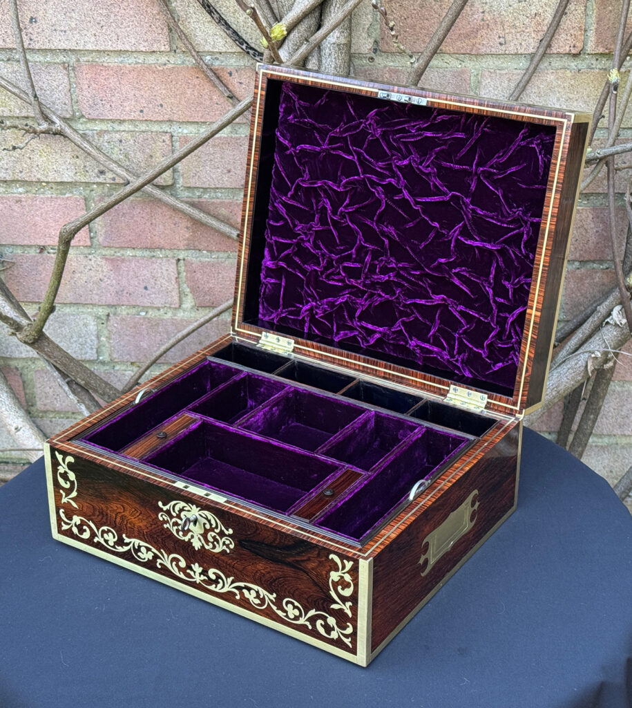 Front right internal view of an Antique Jewellery Box in Rosewood with Scrollwork Brass Inlay.