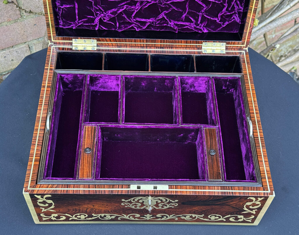 Overhead internal view of an Antique Jewellery Box in Rosewood with Scrollwork Brass Inlay.