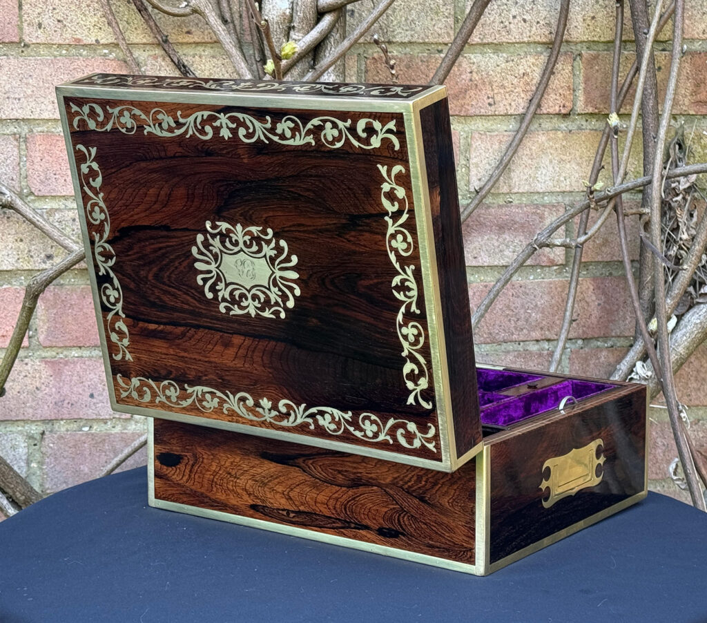Rear open view of an Antique Jewellery Box in Rosewood with Scrollwork Brass Inlay.