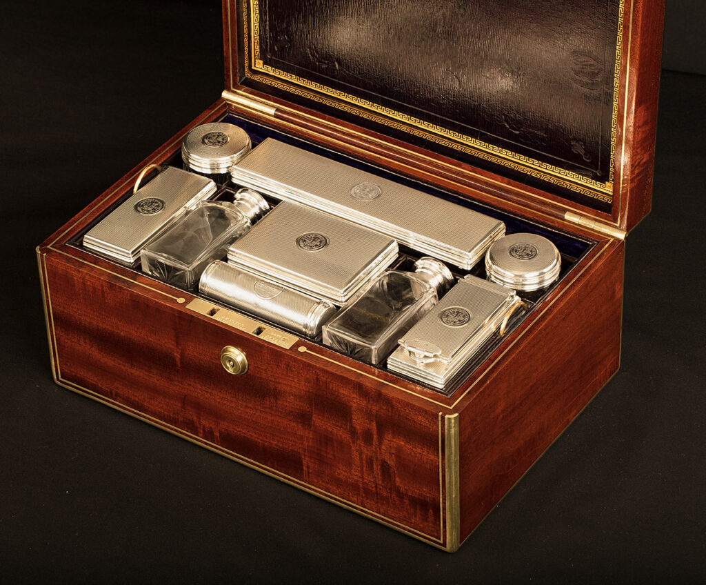 Close up interior view of an Antique Gentleman’s Silver Mounted Dressing Case in Cuban Mahogany, by David Edwards.