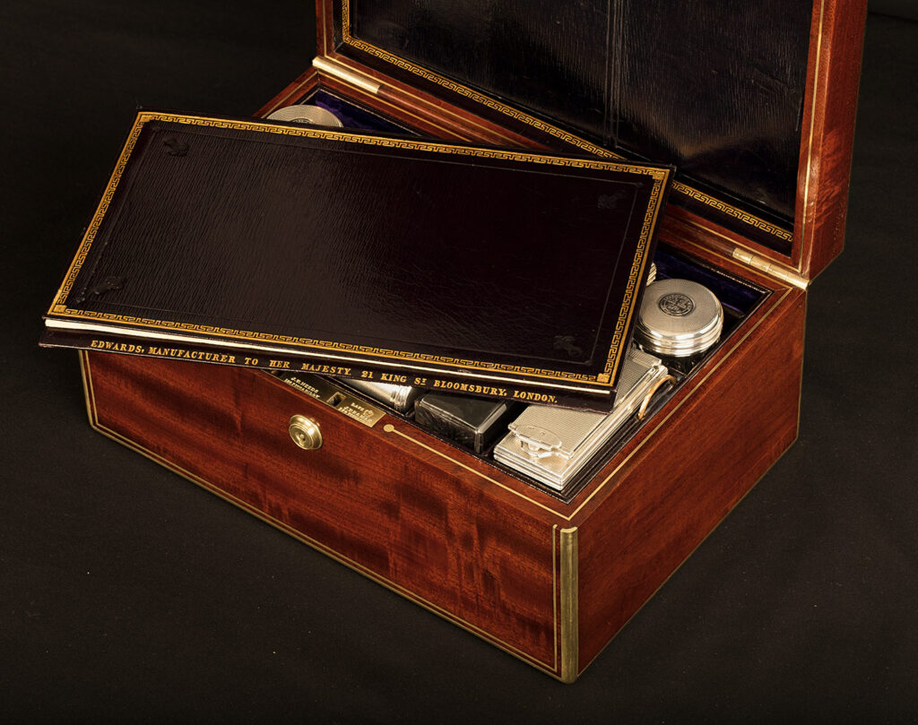 Close up internal view of the removable leather folder from an Antique Gentleman’s Silver Mounted Dressing Case in Cuban Mahogany, by David Edwards.