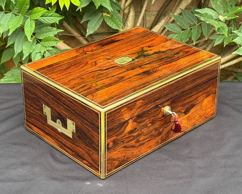 Front left view of an Antique Dressing Case in Rosewood by David Edwards.