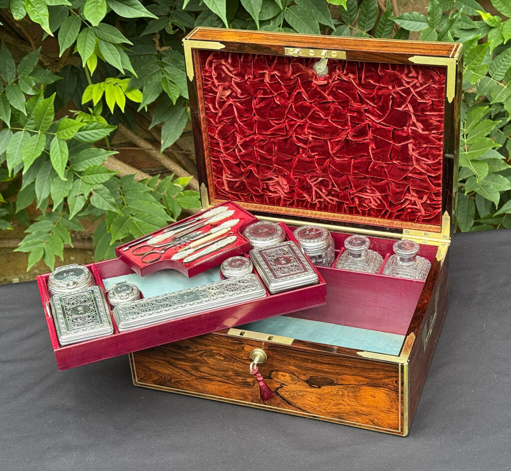 Front internal view of an Antique Dressing Case in Rosewood by David Edwards with trays removed.
