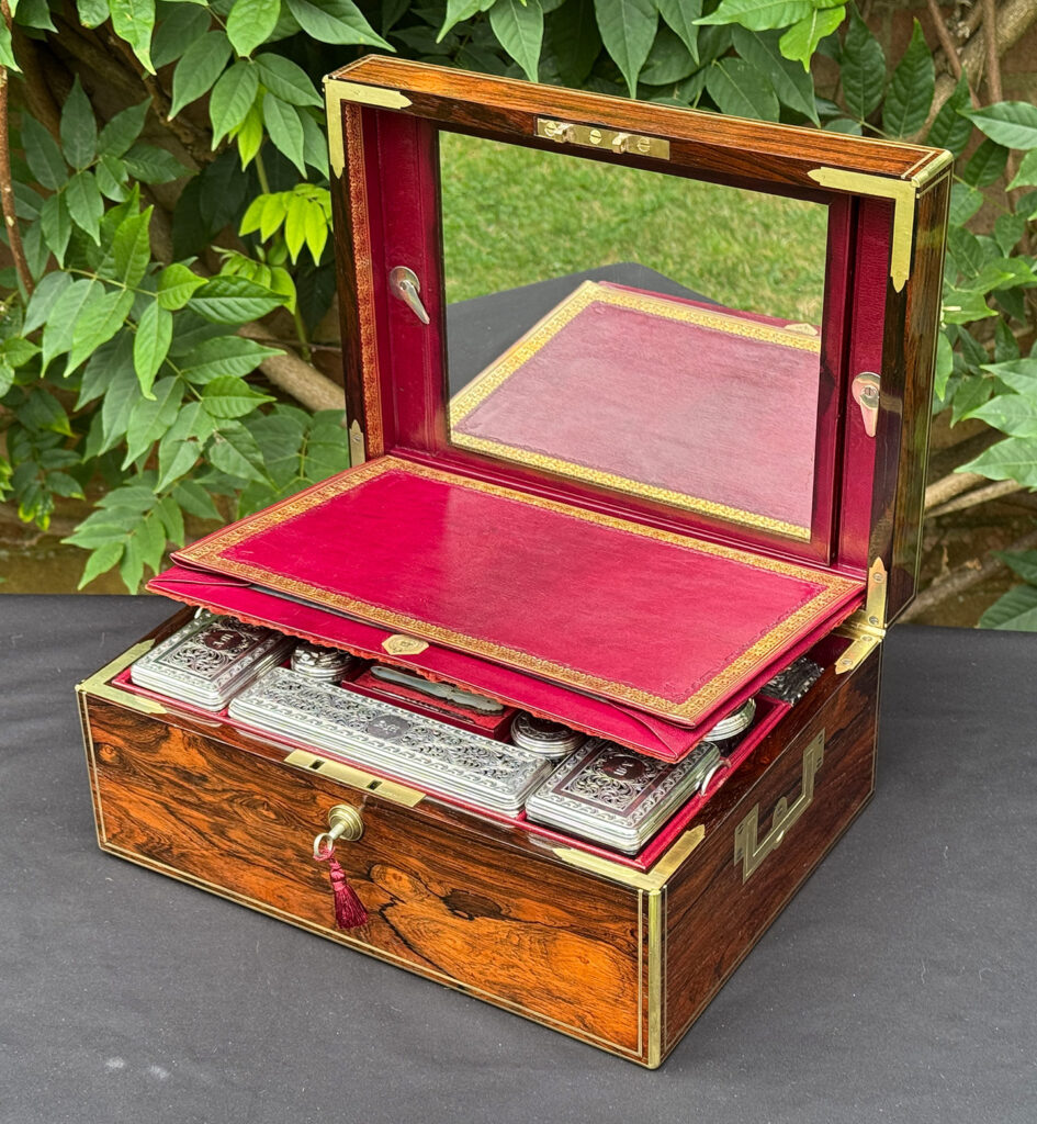 Front right internal view of an Antique Dressing Case in Rosewood by David Edwards displaying its letter wallet.