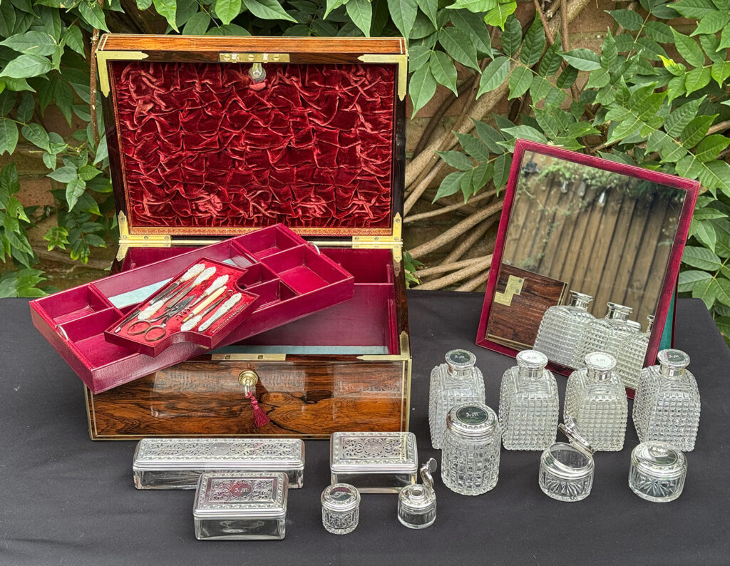 Front view of an Antique Dressing Case in Rosewood by David Edwards with all contents removed.
