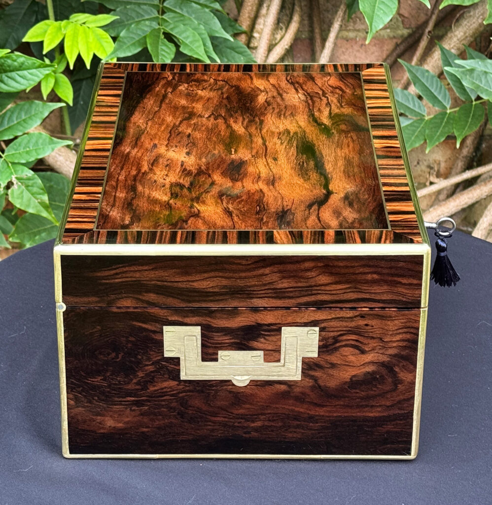 Left side view of an Antique Jewellery Box in Calamander, by Edwards.