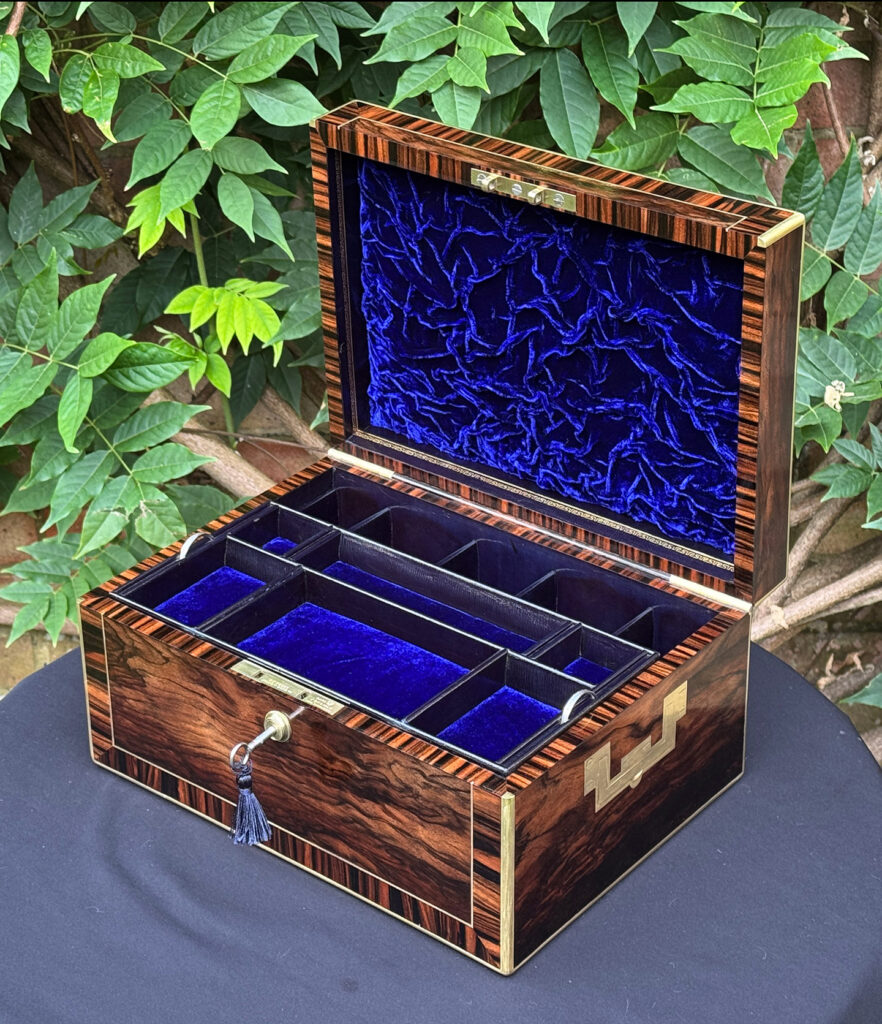 Front right internal view of an Antique Jewellery Box in Calamander, by Edwards.