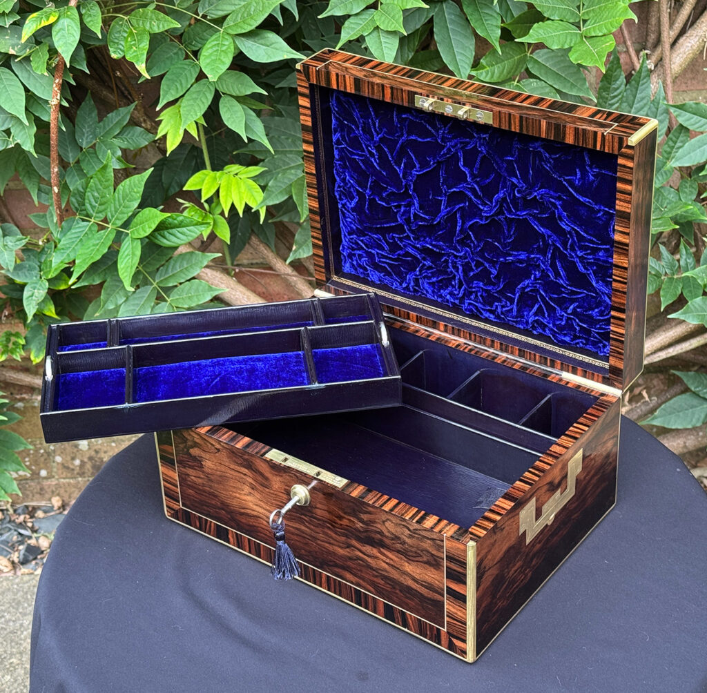 Front right internal view of an Antique Jewellery Box in Calamander, by Edwards with top tray removed.