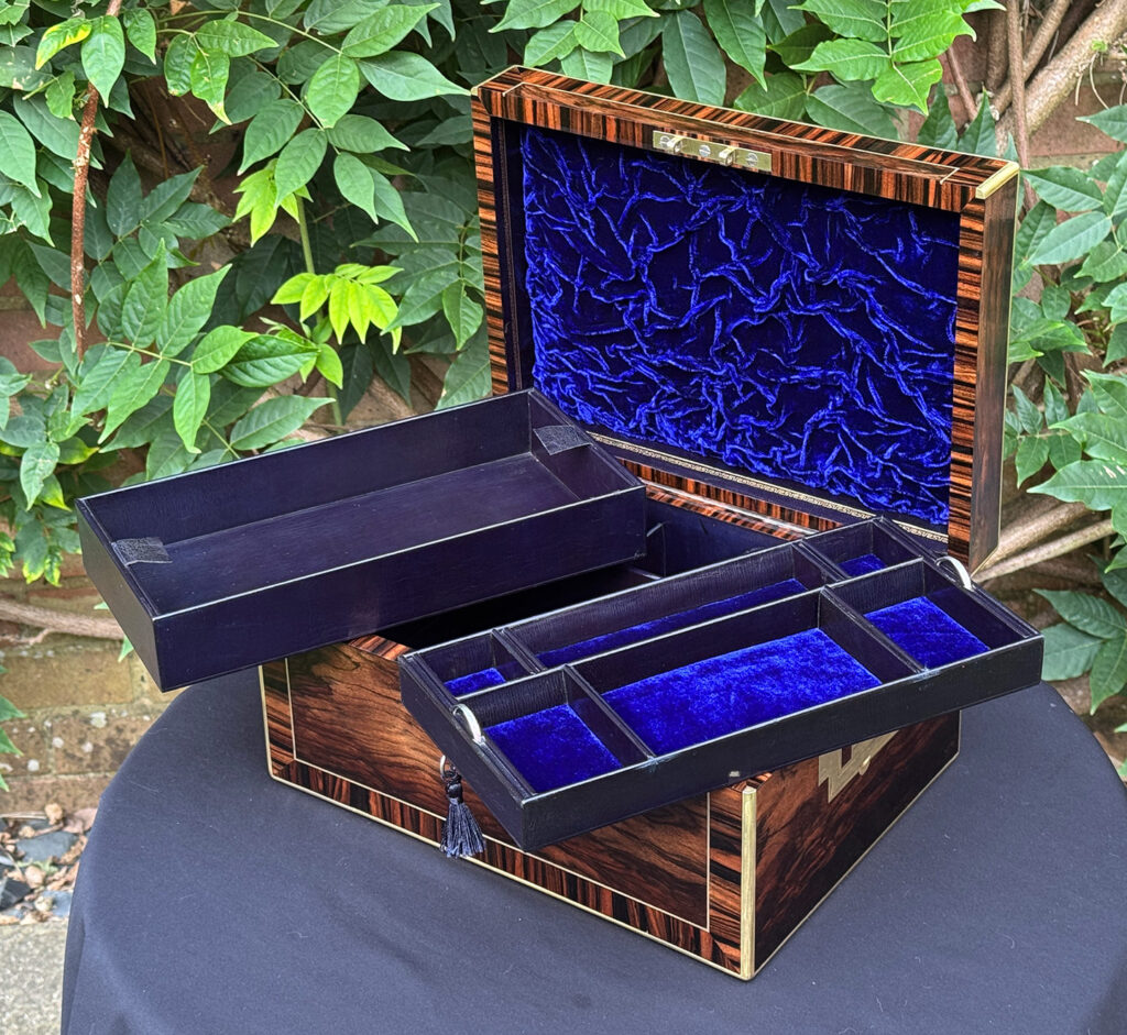 Front right internal view of an Antique Jewellery Box in Calamander, by Edwards with both trays removed.