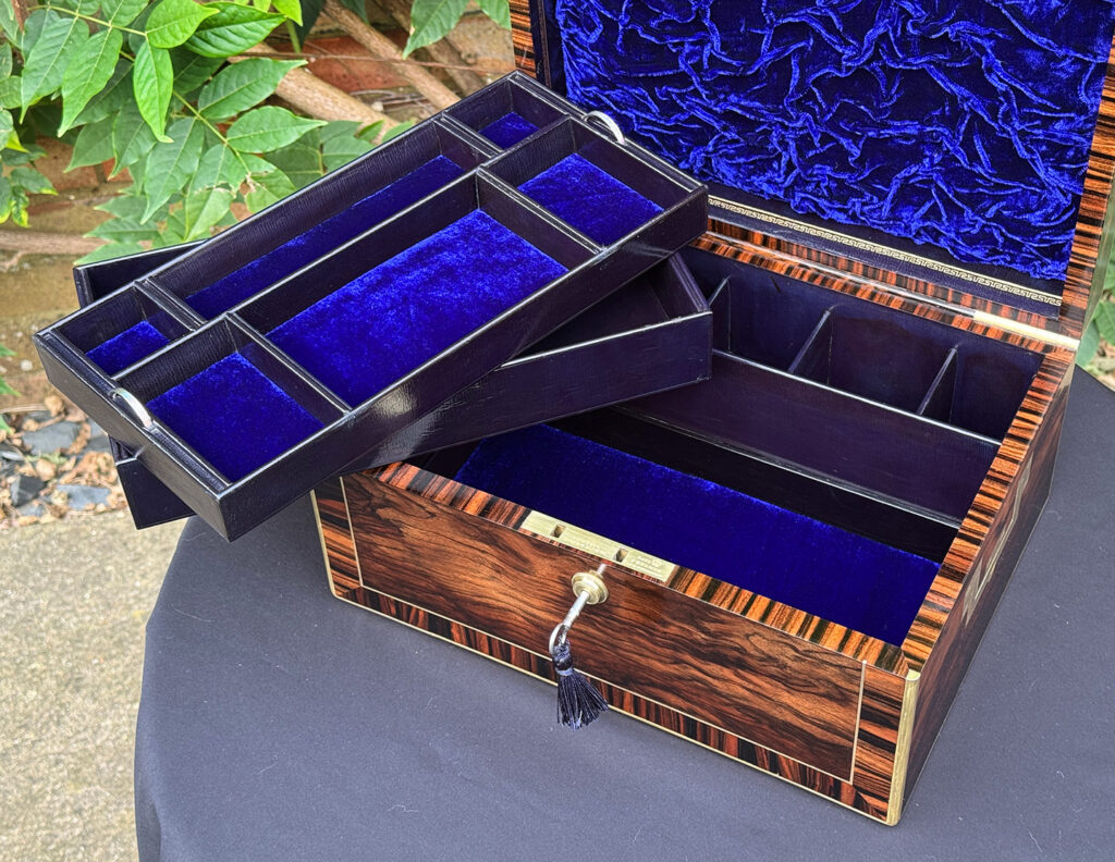 Closer internal view of an Antique Jewellery Box in Calamander, by Edwards with both trays removed.