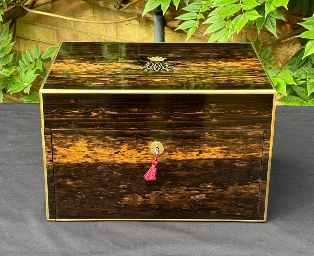 Front view of an Antique Jewellery Box with Secret Internal Travelling Box and Glass Display Area.