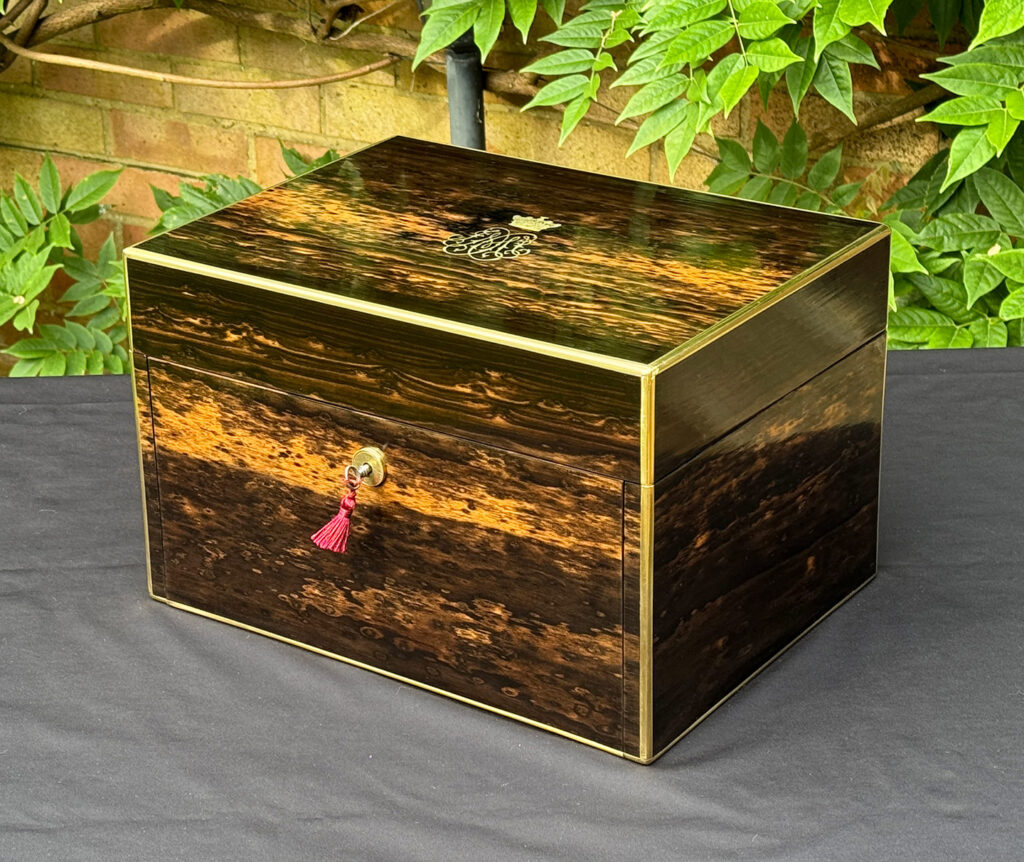 Front right view of an Antique Jewellery Box with Secret Internal Travelling Box and Glass Display Area.