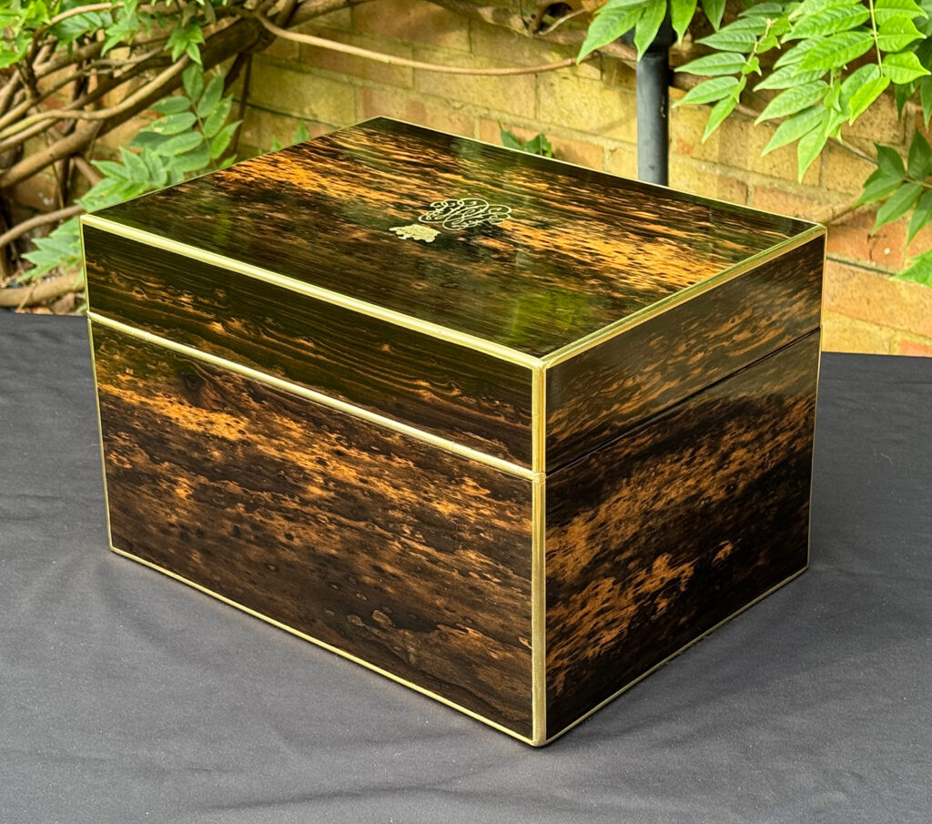 Rear left view of an Antique Jewellery Box with Secret Internal Travelling Box and Glass Display Area.
