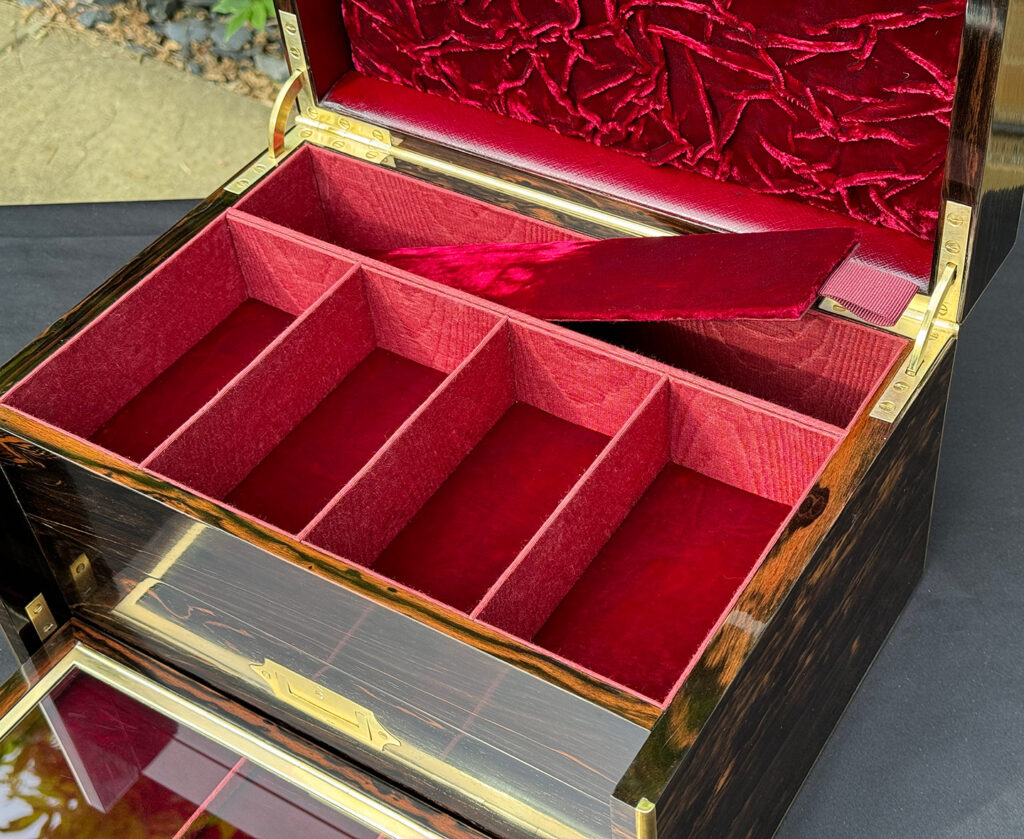 Close up internal view of an Antique Jewellery Box with Secret Internal Travelling Box and Glass Display Area.