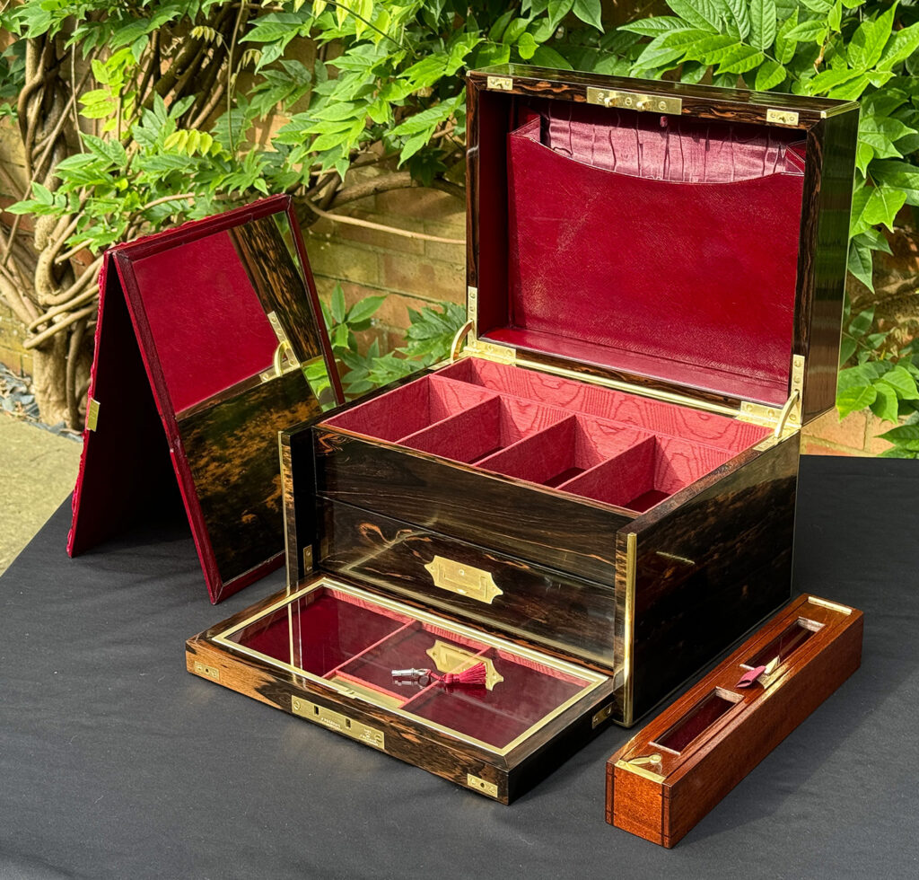View of an Antique Jewellery Box with Secret Internal Travelling Box and Glass Display Area with all contents removed.