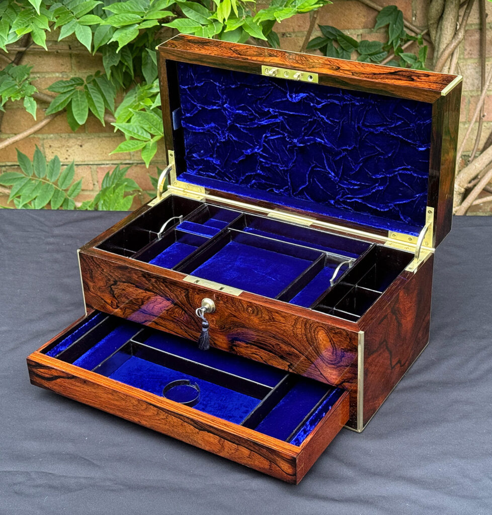 Front right internal view of an Antique Jewellery Box in Rosewood with lower drawer open.