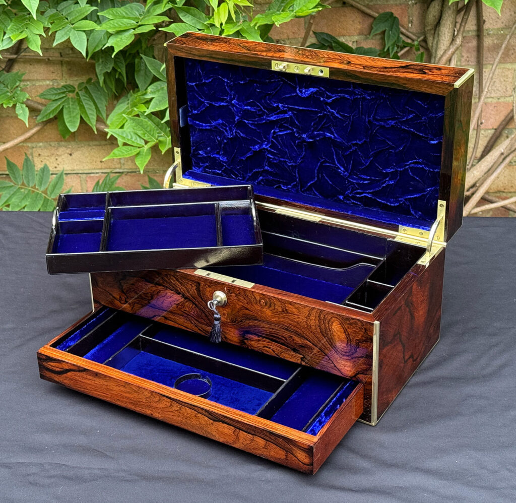 Front right internal view of an Antique Jewellery Box in Rosewood with lower drawer open and tray removed.