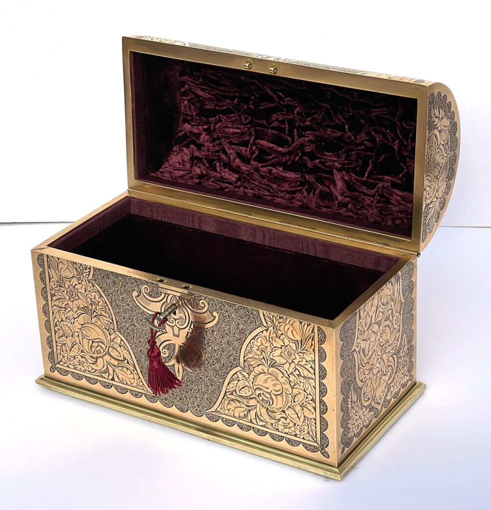 Front right internal view of an Antique Engraved Brass Jewellery Box, by George Betjemann and Sons.