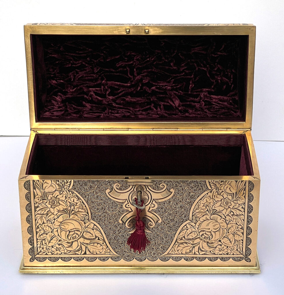 Front internal view of an Antique Engraved Brass Jewellery Box, by George Betjemann and Sons.