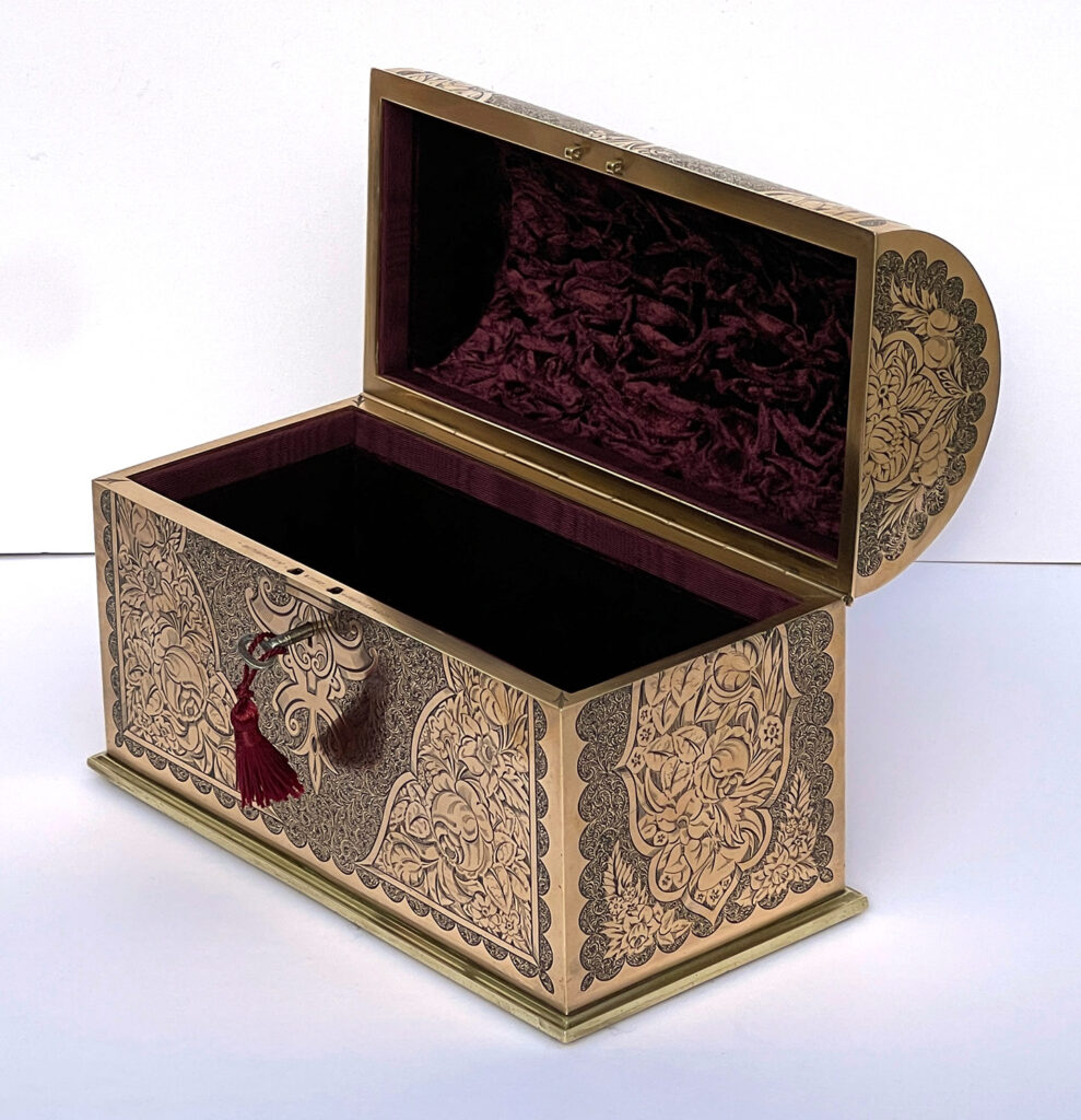 Front right internal view of an Antique Engraved Brass Jewellery Box, by George Betjemann and Sons.