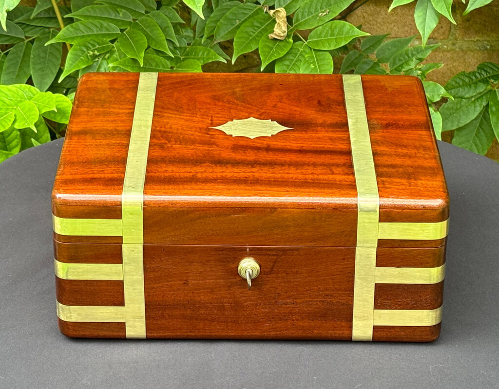 Front overhead view of an Antique Travelling Jewellery Box in Solid Mahogany.