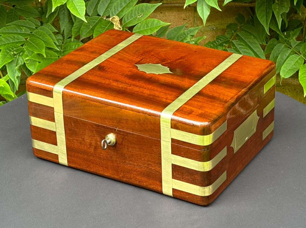 Front right view of an Antique Travelling Jewellery Box in Solid Mahogany.
