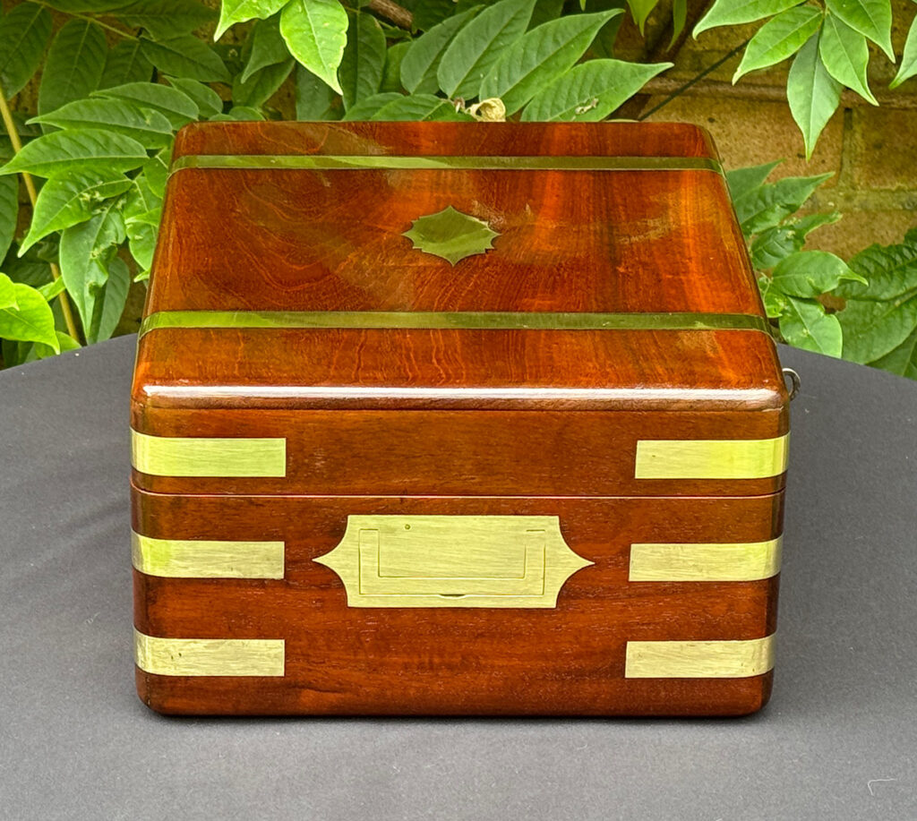 Left side view of an Antique Travelling Jewellery Box in Solid Mahogany.