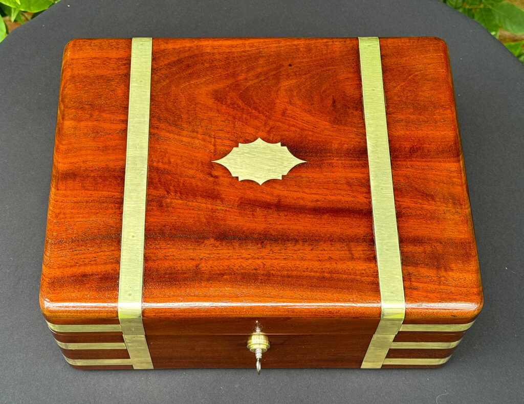 Top view of an Antique Travelling Jewellery Box in Solid Mahogany.