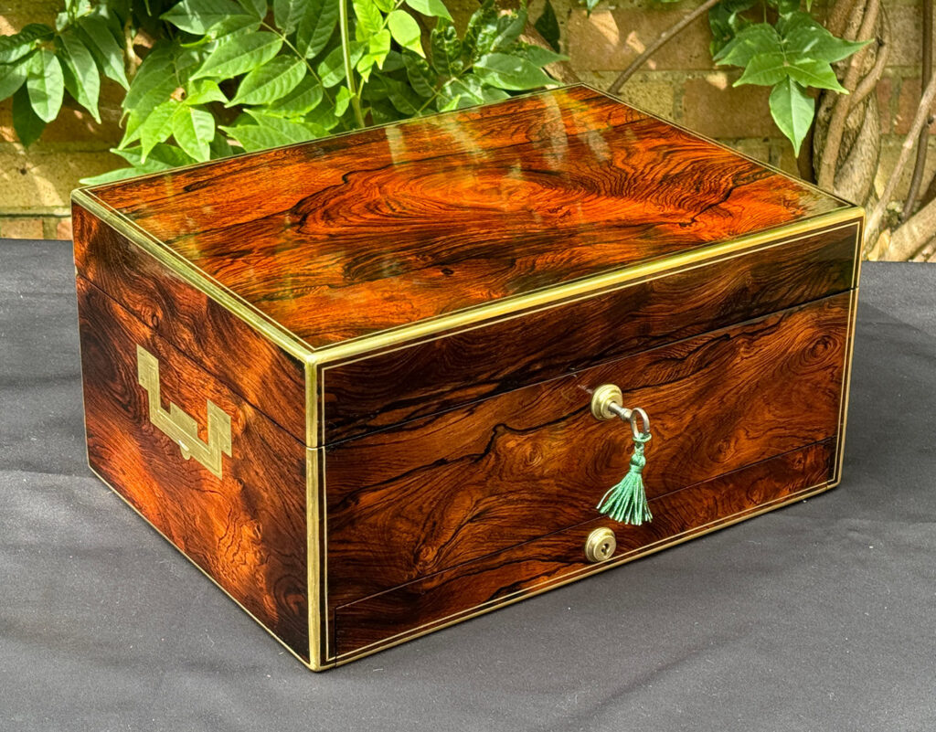 Front left view of an Antique Jewellery Box in Rosewood, by Edwards.