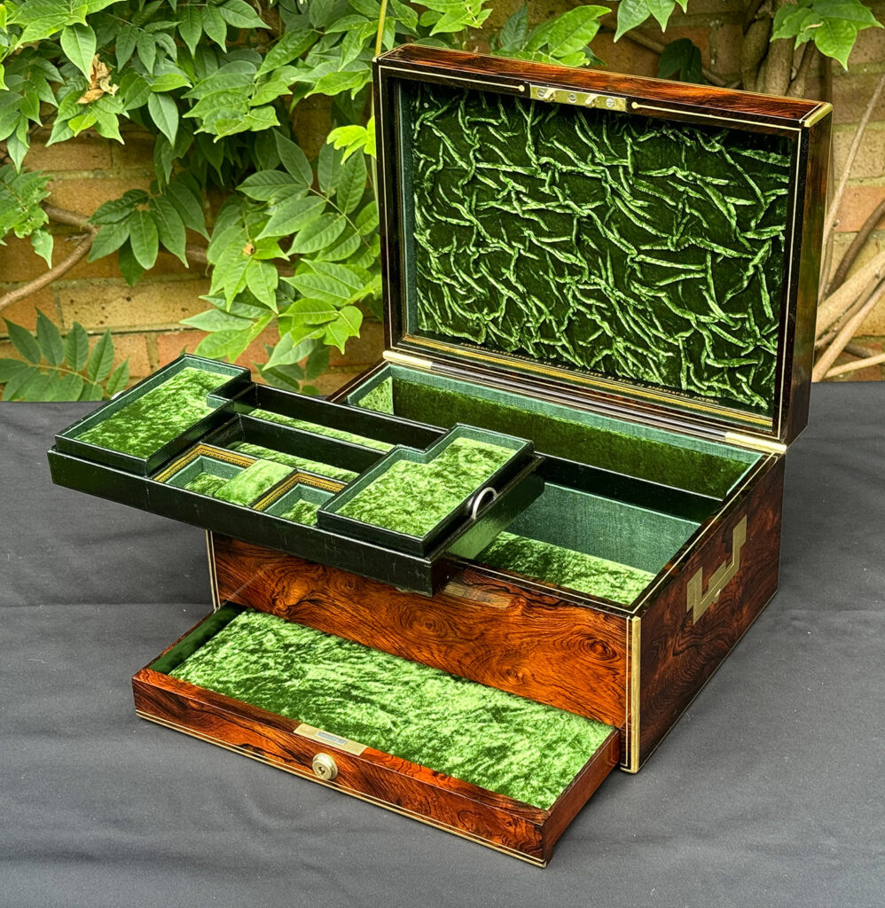 Front right internal view of an Antique Jewellery Box in Rosewood, by Edwards with trays removed.
