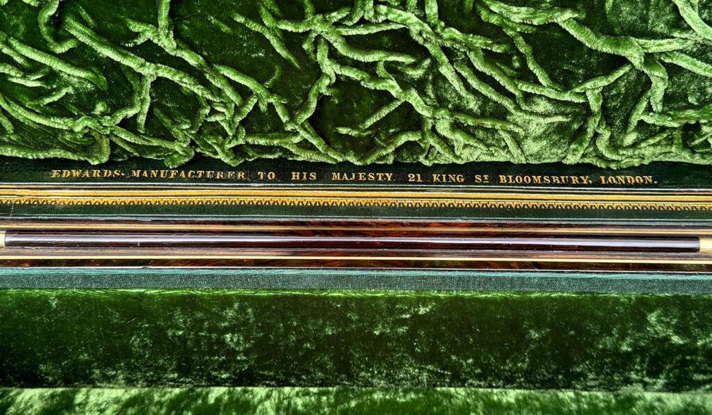 Close up of makers mark from an Antique Jewellery Box in Rosewood, by Edwards.