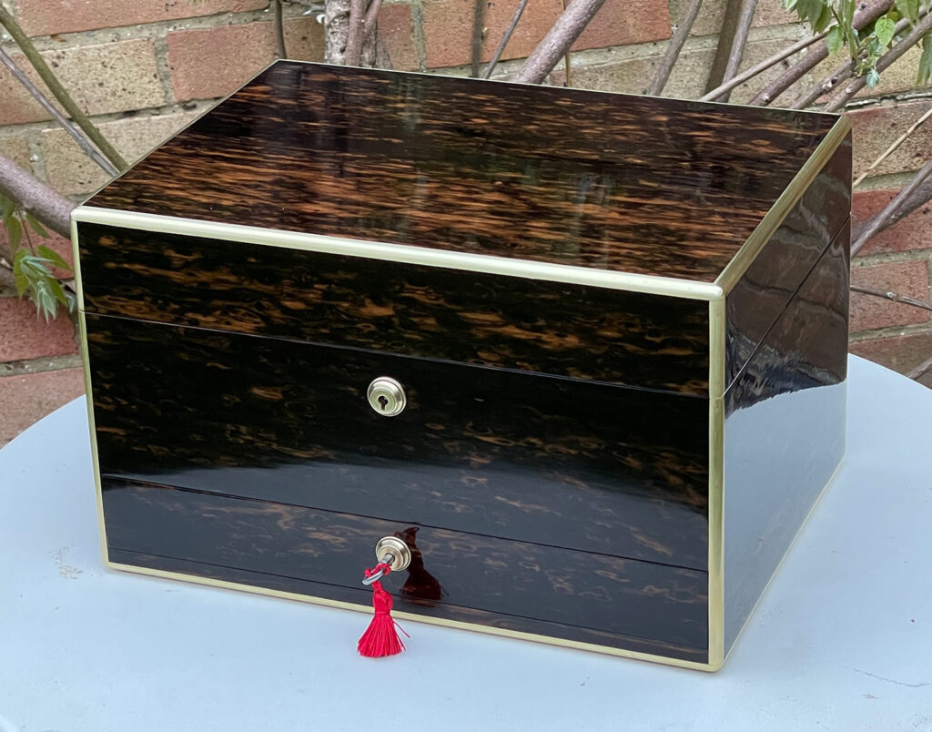 Front right view of an Antique Jewellery Box in Coromandel.