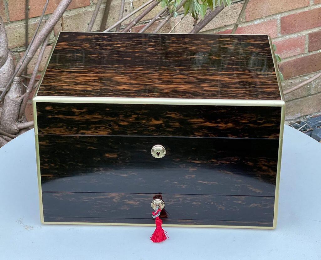 Front view of an Antique Jewellery Box in Coromandel.