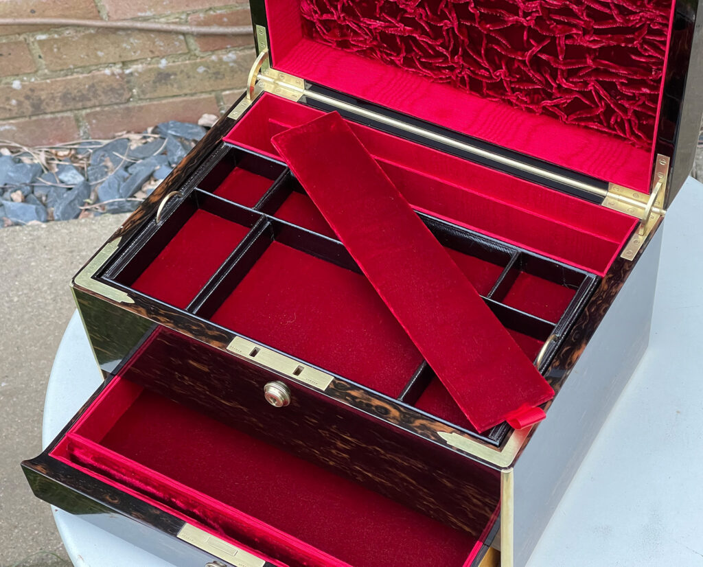 Overhead internal view of an Antique Jewellery Box in Coromandel with concealed floor removed.