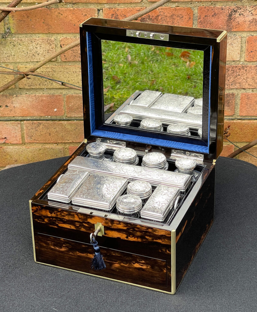Front right internal view of a Miniature Antique Dressing Case in Coromandel, by Betjemann and Sons.