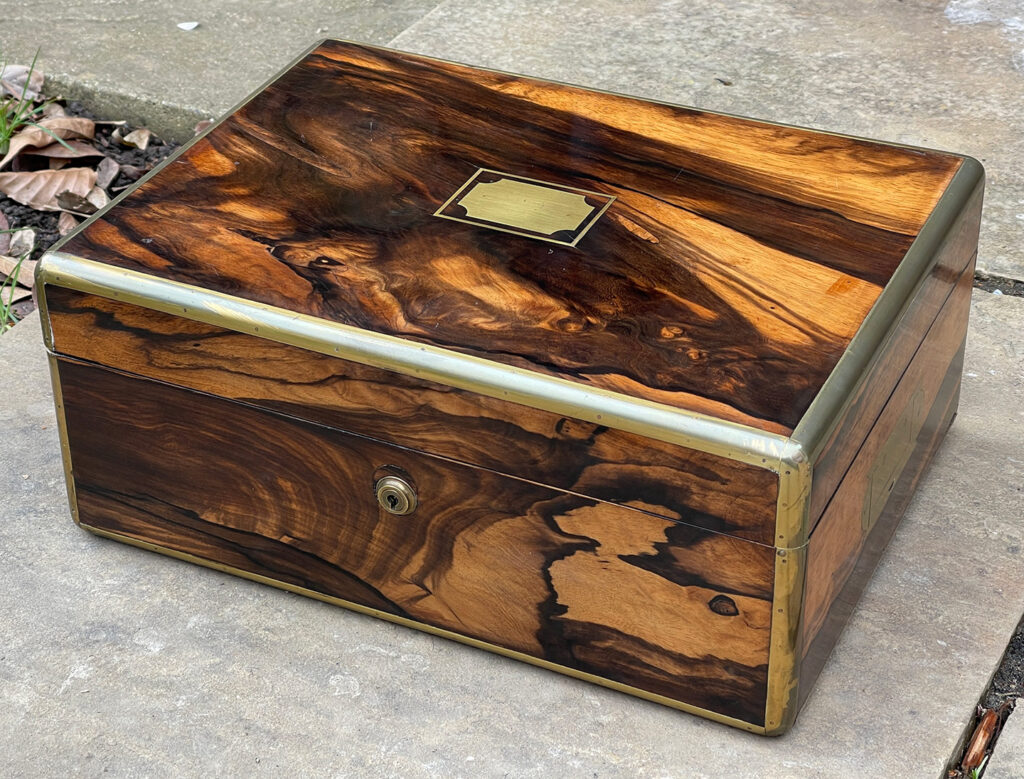 Front right overhead view of an Antique Jewellery Box in Calamander.