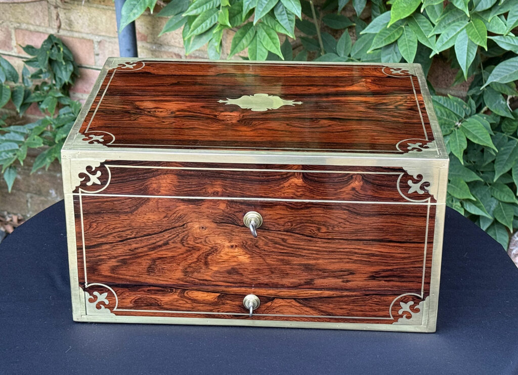 Front view of an Antique Jewellery Box in Rosewood, by Edwards.