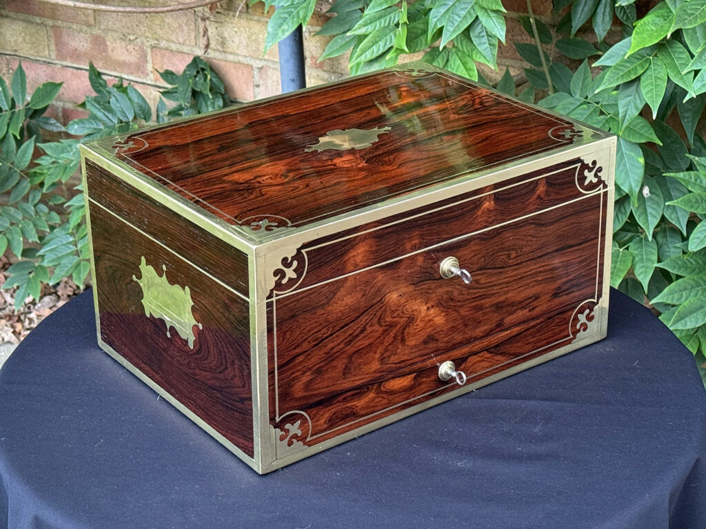 Front left view of an Antique Jewellery Box in Rosewood, by Edwards.