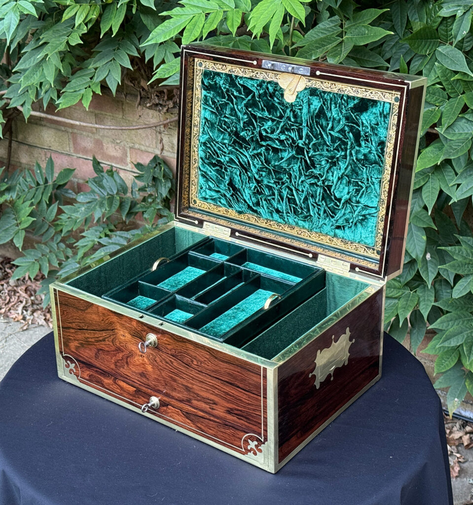 Front right internal view of an Antique Jewellery Box in Rosewood, by Edwards.