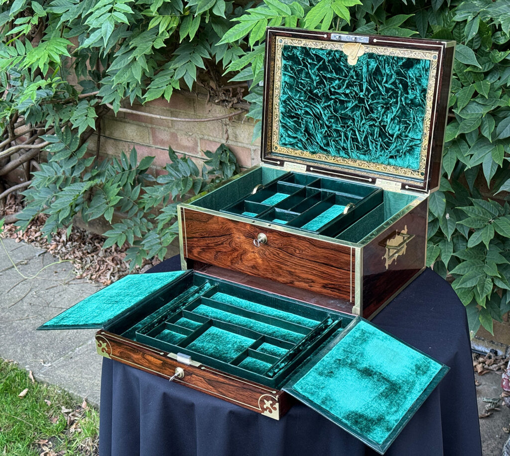 Front right internal view of an Antique Jewellery Box in Rosewood, by Edwards with lower drawer fully open.