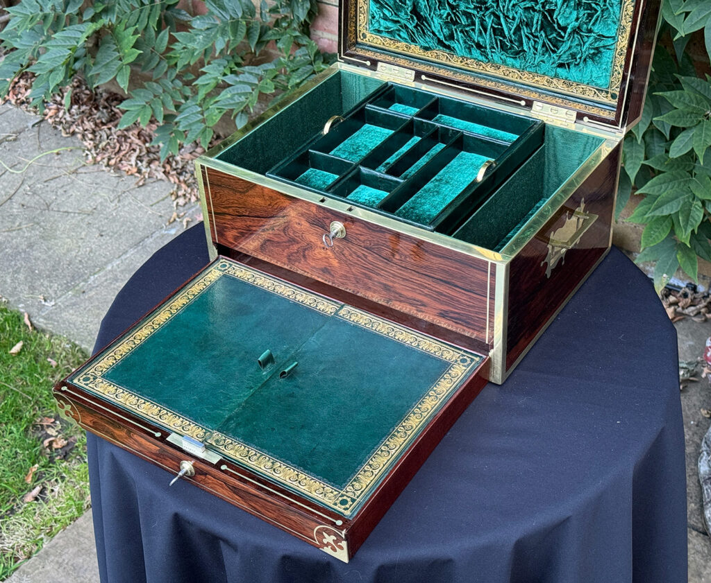 Overhead internal view of an Antique Jewellery Box in Rosewood, by Edwards with lower drawer open.