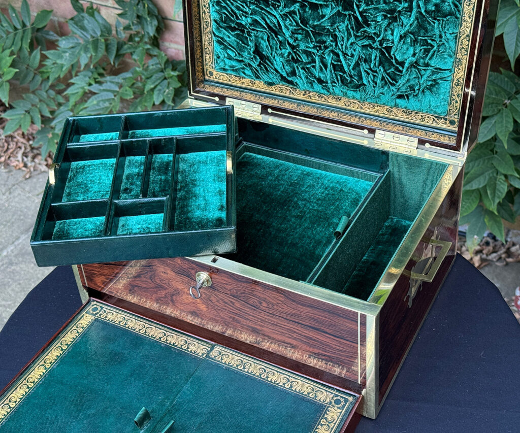 Overhead internal view of an Antique Jewellery Box in Rosewood, by Edwards with one tray removed.