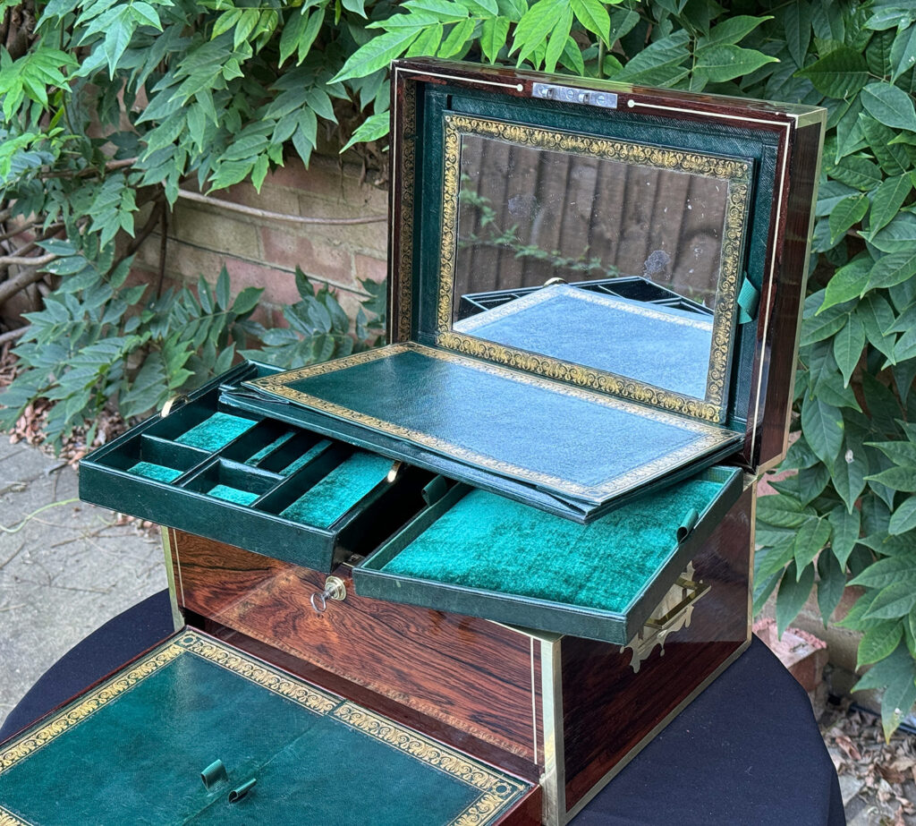 Closer internal view of letter wallet and mirror panel removed from an Antique Jewellery Box in Rosewood, by Edwards.