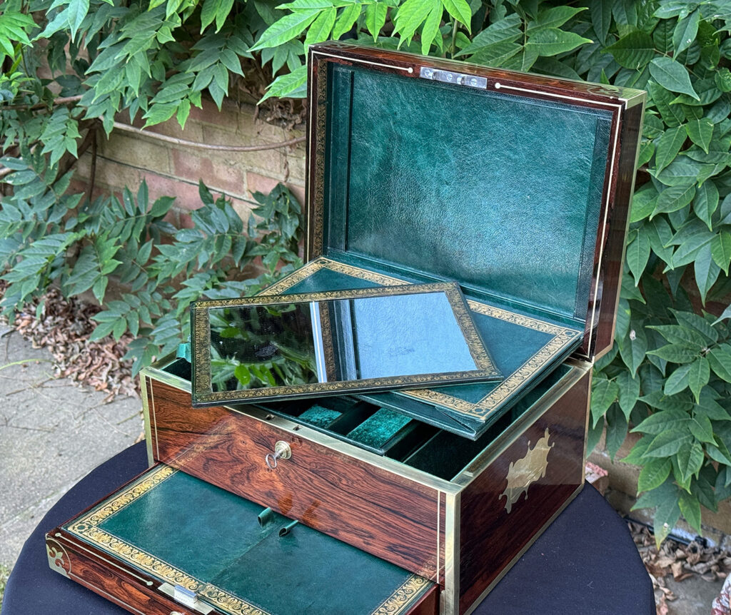 Front right internal view of an Antique Jewellery Box in Rosewood, by Edwards with mirror panel removed.