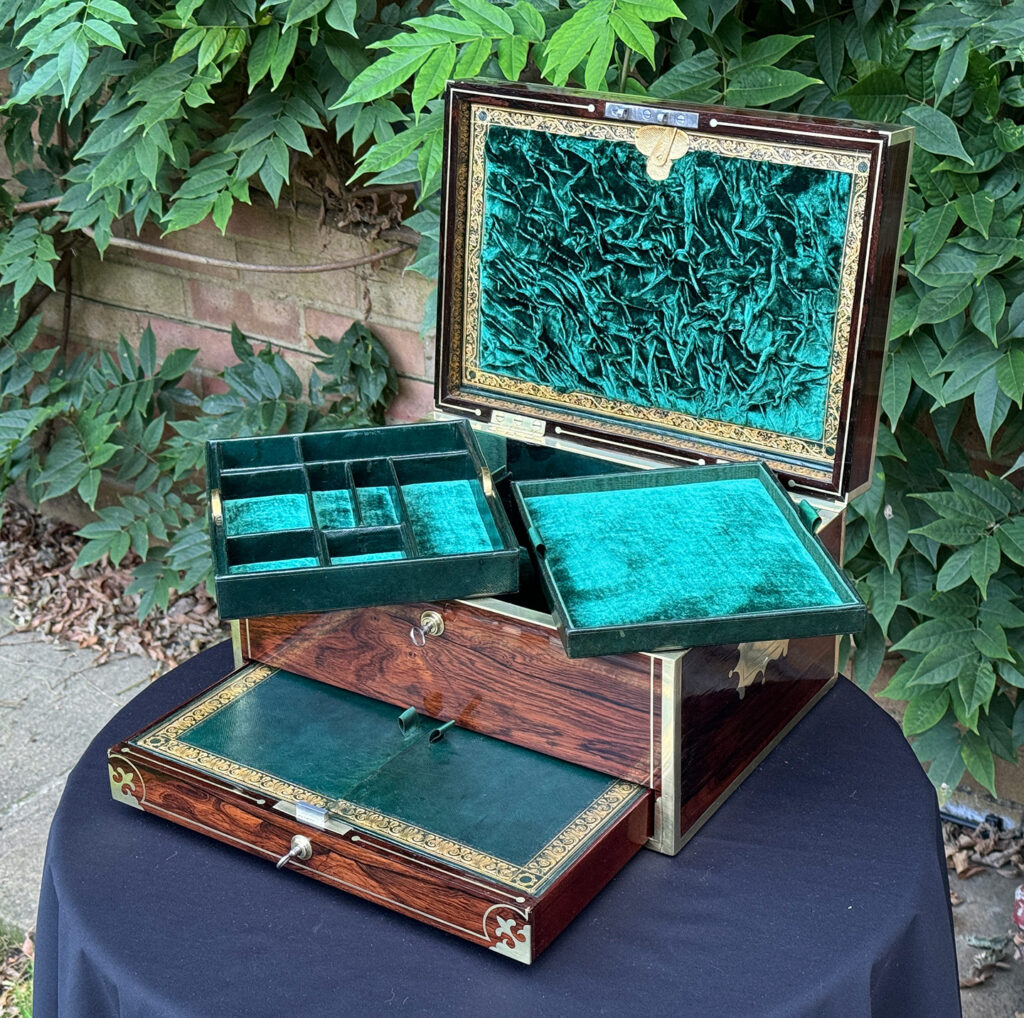 Front right internal view of an Antique Jewellery Box in Rosewood, by Edwards with trays removed.