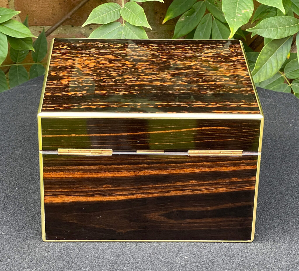 Rear view of a Miniature Antique Gentleman’s Dressing Case in Calamander.