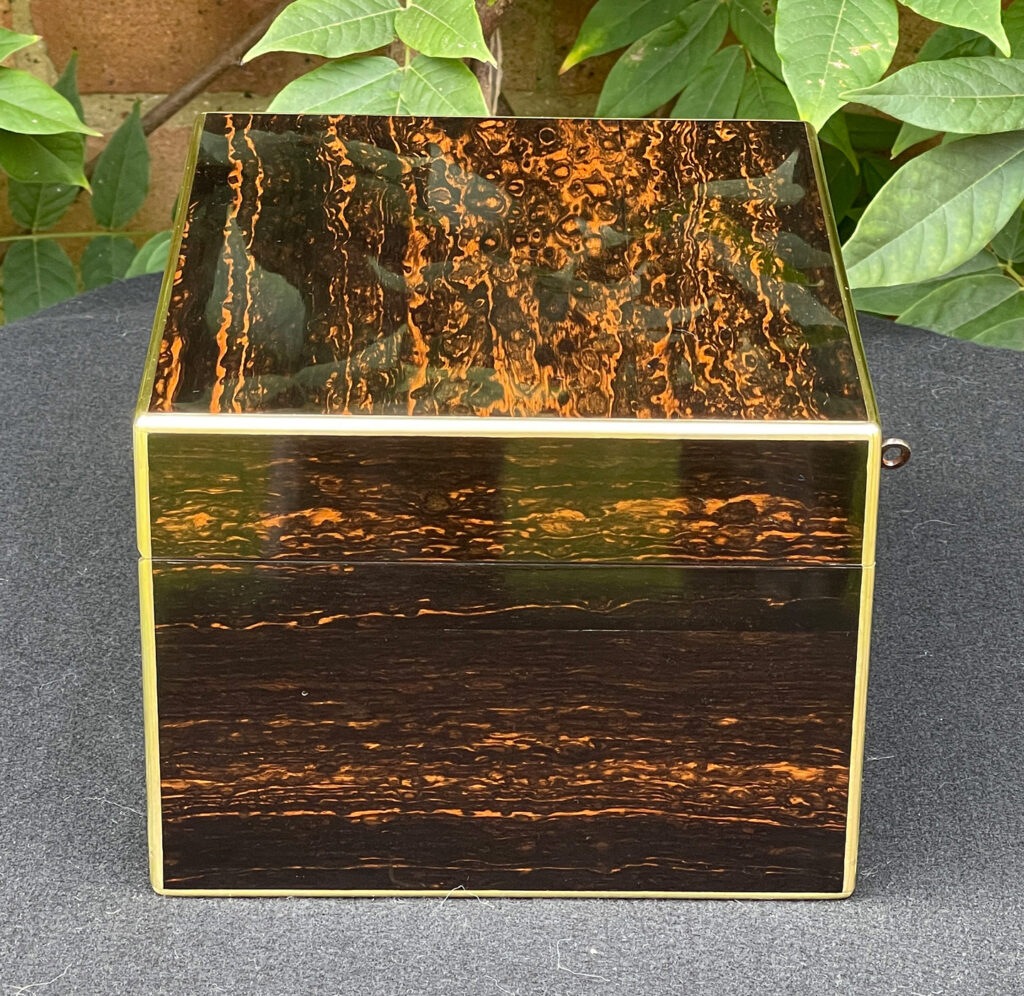 Left side view of a Miniature Antique Gentleman’s Dressing Case in Calamander.